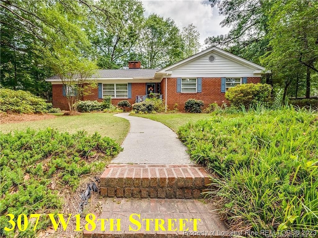 1103 N ELM ST  